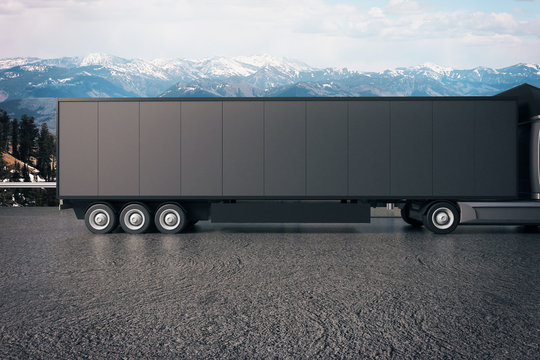 Black truck trailer on landscape background