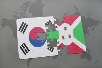 puzzle with the national flag of south korea and burundi on a world map background.