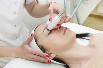woman is in the process at the clinic lipomassage