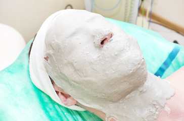 man in the mask cosmetic procedure in spa salon