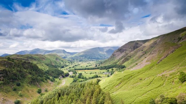Fast Moving Dramatic Cumulus Clouds over Keswick Valley in Lake District, UK