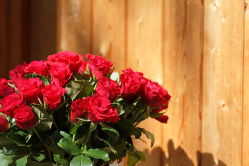 The bouquet of red roses in a vase