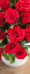 The bouquet of red roses in a vase