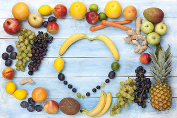 Fruits on a blue wooden board, top view