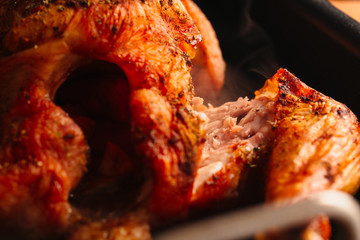 Baked chicken with fresh browned crust closeup