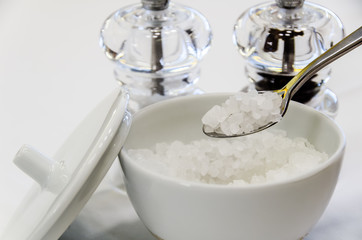 Little white ceramic bottle with sugar