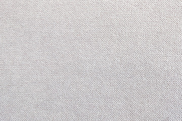 Brown pastel woven canvas patterns from floor chair background. Gray fabric texture. Pattern of organic cotton. White sack linen backdrop.