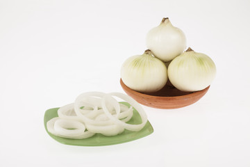 onion slices on neutral background