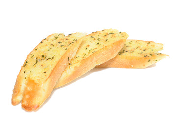Garlic breads in row on white background