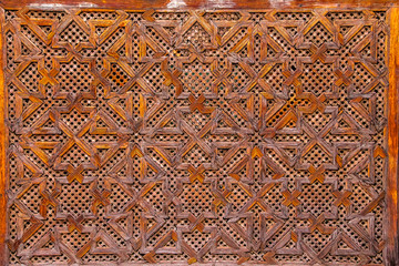 Wood carving of geometry islamic pattern - Morocco