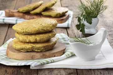 Pancakes made from corn flour with spinach and herbs © geshas