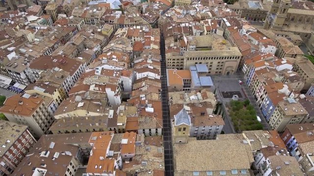 Flying above narrow city streets in Pamplona, Spain