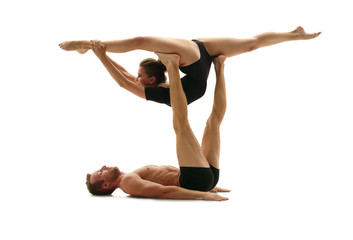 Acrobatics. Man and woman doing splits in support