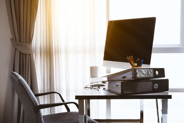 Manager Table with Desktop Computer and Business Notes