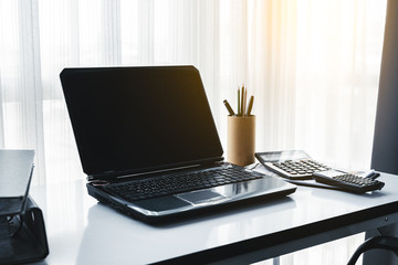 Office workplace with laptop