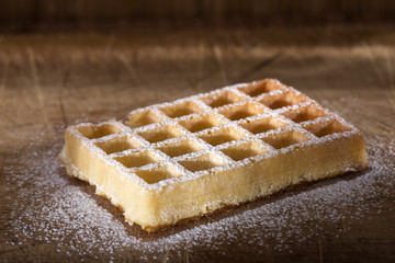 Fresh waffle with powdered sugar