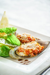 mussels baked with parmesan and herbs