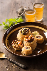 Traditional syrian dessert with nuts on plate