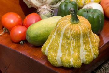 fresh crop of vegetables lay in a pile on the table