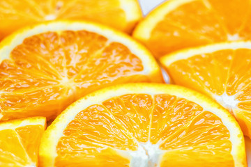 Fototapeta na wymiar Fresh juicy orange fruit slice isolated. Citrus fruit-natural vitamin C. Studio photography.