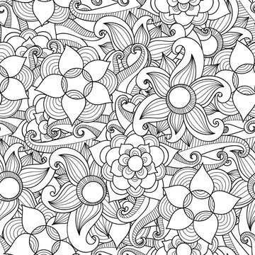 Doodle flowers seamless pattern.
Zentangle style flowers and leaves background. Black and white hand drawn herbal pattern.
