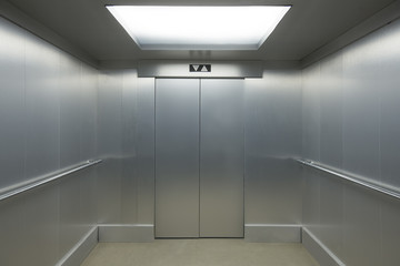 Interior view of a modern elevator - obrazy, fototapety, plakaty