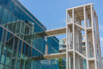 skyscraper against sky and building in city