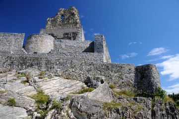 Ruins of the medieval Old Castle on the top of the hill above the village Smlednik, Slovenia. it was probably built in 11th century.  The hole in the wall is the entrance to the tower.