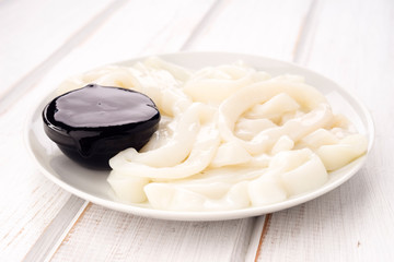 plate with ink squid rings and concentrated