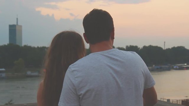 Urban couple enjoying in the city view.
