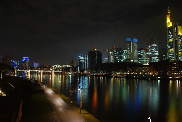 Fototapeta na wymiar Skyscrapers of Frankfurt night view from the Main embankment