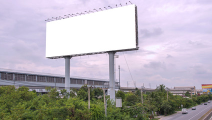 Blank billboard ready for new advertisement with blue sky backgr