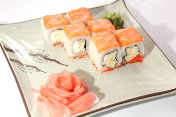 Japanese roll with wasabi sauce on plate