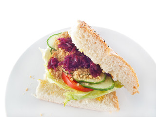 vegan bread with vegetable filling and chopped spiced peanuts