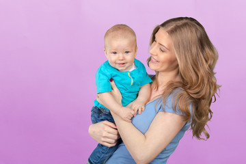 Happy young mother and her son