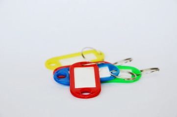 colorful plastic name tag on white background