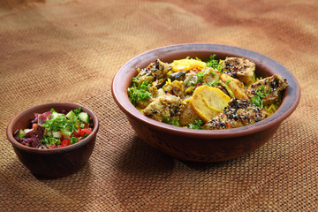Traditional Middle Eastern dish cooked with spices. Maklyuba - Stock photo