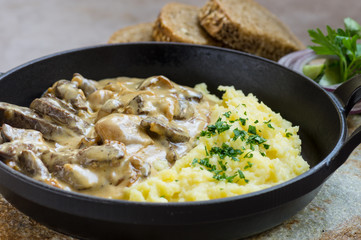 beef Stroganoff beef with mushrooms and mashed potatoes