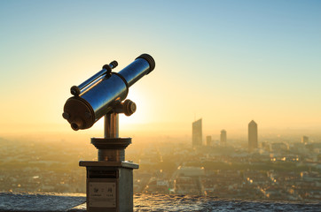 Telescope and panoramic view at Lyon from Fourviere Basilica hill. France