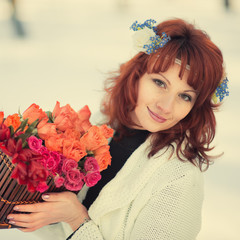 Fototapeta premium Beautiful woman smiling in the woods in spring