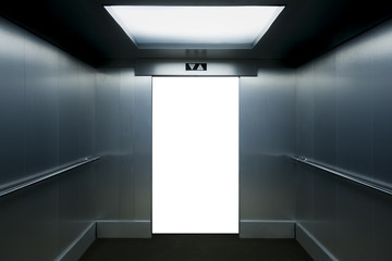 Interior view of a modern elevator with open doors isolated on white