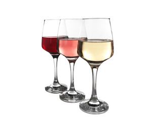 Glasses of rose, red and white wine isolated on white
