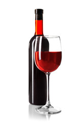 Red wine glass and bottle isolated on white
