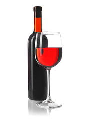 Red wine glass and bottle isolated on white
