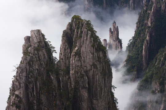 Huang Shan, which means Yellow Mountain. Anhui Province in China. Jagged rock towers.