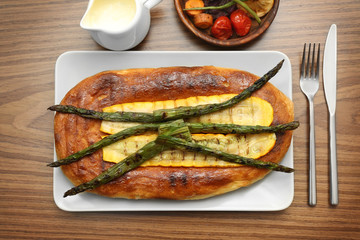 Tasty dish of grilled vegetables and baked bread