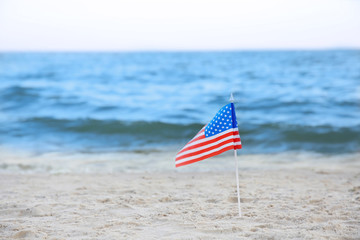 American flag on beach