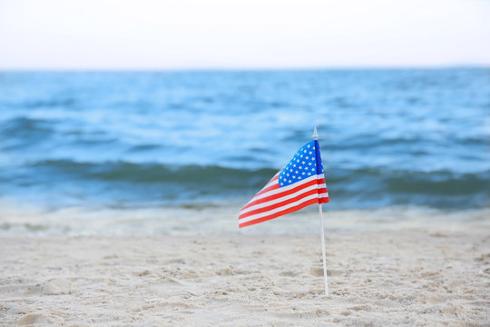 American Flag On Beach