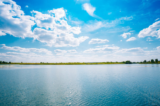 Riverine Skyline Landscape, River Lake Water Surface, Blue Clouds