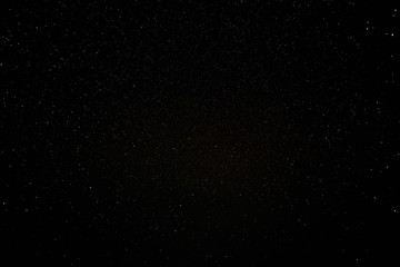 Fototapeta premium Natural Black Night Sky With Bright Stars Background Texture